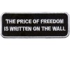 PRICE OF FREEDOM WRITTEN ON WALL white